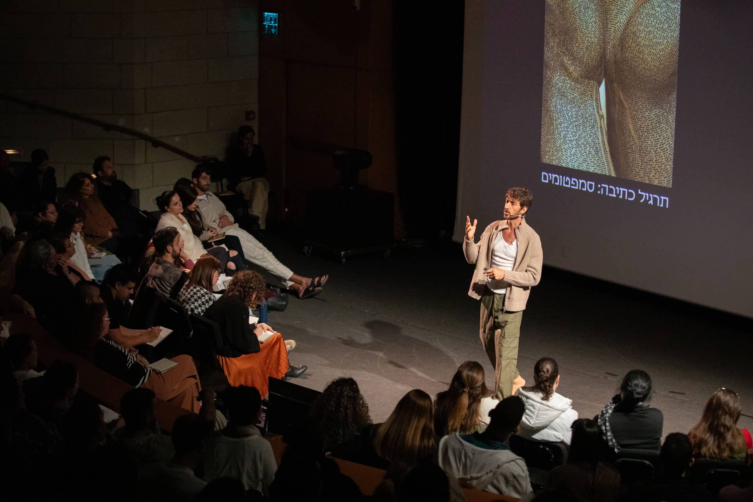 Matan Hakimi speaking at a Gut Feeling academy event